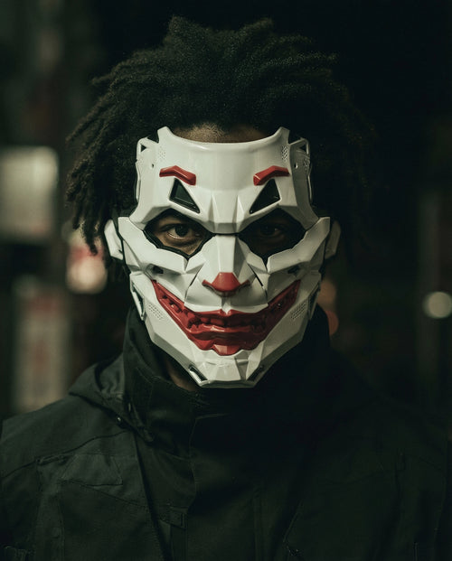 MEZZANOTTE — white and red armored cyberpunk mask on model, night flash portrait